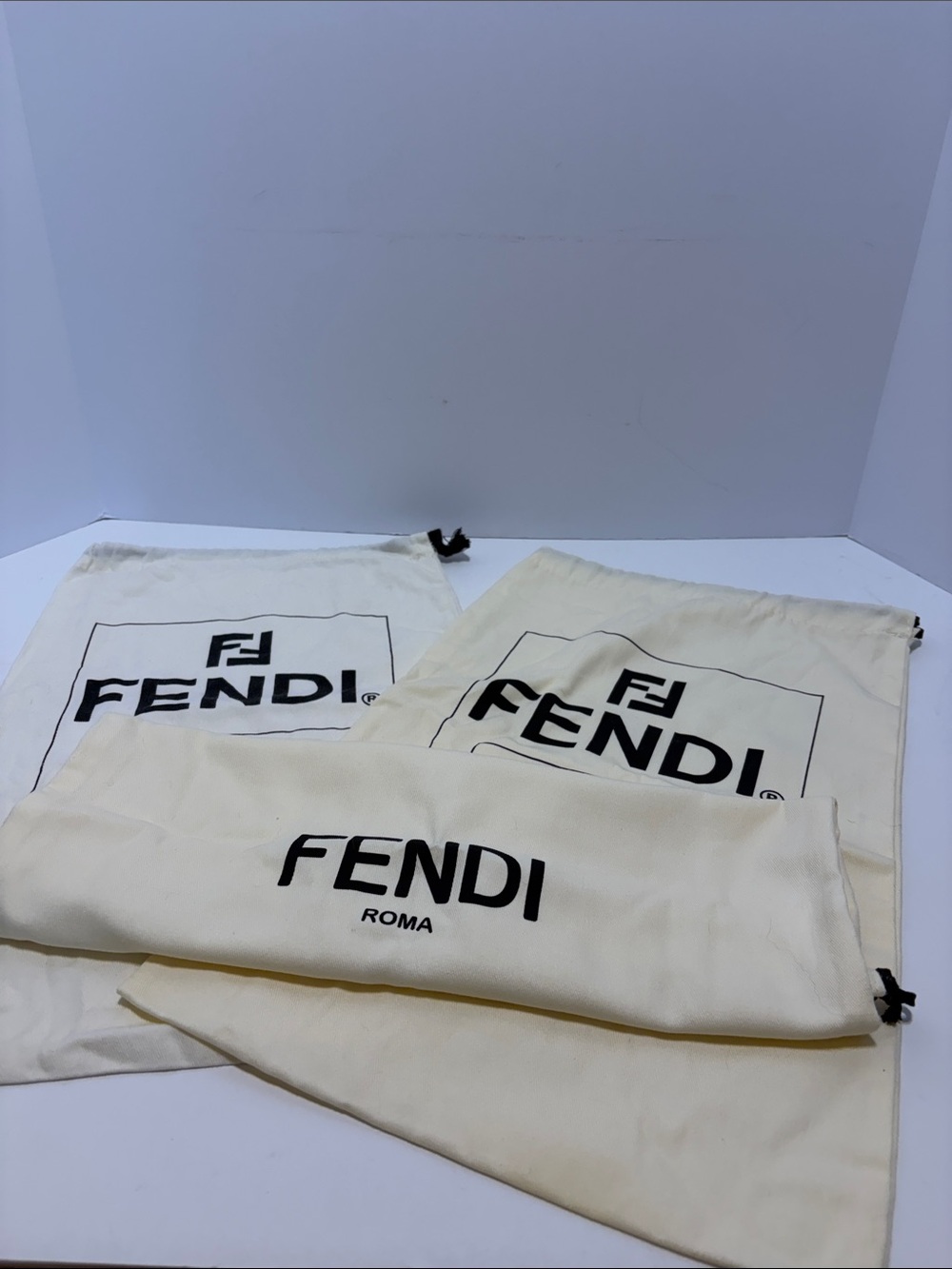3 Fendi dust bags